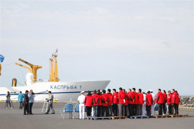 Setting up for a photo with the president
