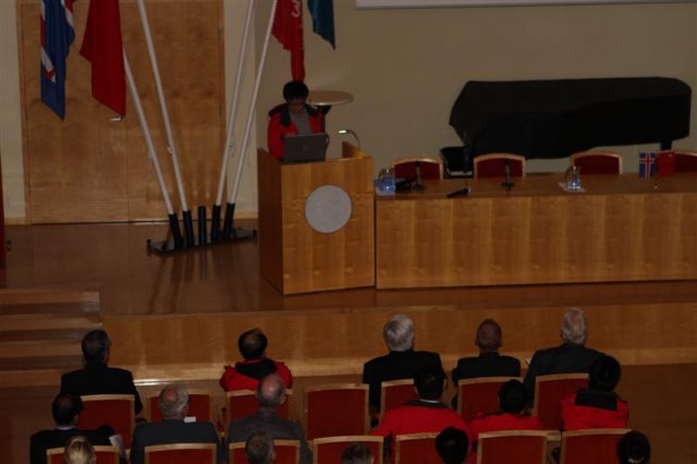 Dr. Yang speaking at the symposium